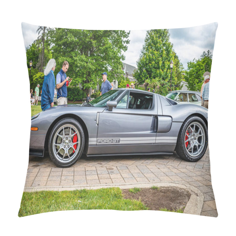 Personality  Highlands, NC - June 10, 2022: Low perspective side view of a 2006 Ford GT Hardtop Coupe at a local car show. pillow covers