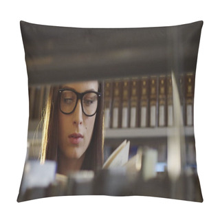 Personality  Young Attractive Woman Student In Glasses Turning Pages In A Book She Took From Books On The Shelves In The Library. Portrait. Close Up. Inside Pillow Covers