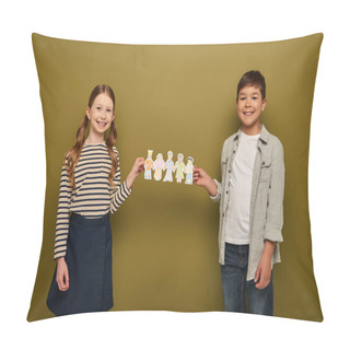 Personality  Smiling Multiethnic Preteen Friends In Casual Clothes Holding Paper Drawn Characters And Looking At Camera During Child Protection Day Celebration On Khaki Background Pillow Covers