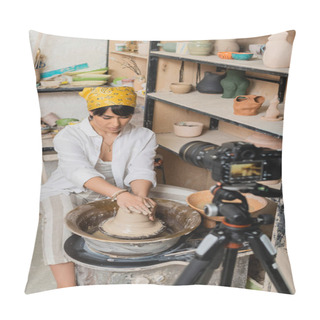 Personality  Young Brunette Asian Artist In Headscarf Molding Wet Clay And Working On Pottery Wheel Near Blurred Digital Camera On Tripod In Ceramic Workshop, Pottery Studio Workspace And Craft Concept Pillow Covers