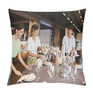Personality  Joyful Team Arranging Festive Table Setting And Placing Flowers Near Dishware In Event Hall Pillow Covers