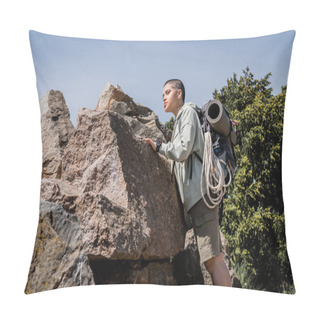 Personality  Young Tattooed And Short Haired Female Tourist With Backpack And Travel Equipment Touching Stone And Looking Away While Standing With Nature At Background, Exploring New Horizons, Summer Pillow Covers