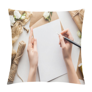 Personality  Cropped View Of Woman Writing In Card With Ink Pen Over Eustoma, Cloth, Envelope And Wrapped Gift On Grey Background Pillow Covers
