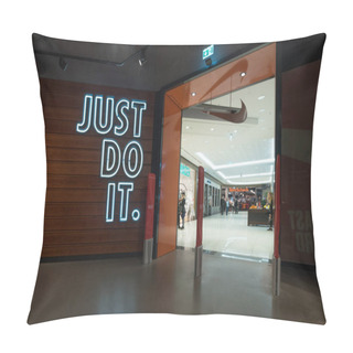 Personality  BERLIN, GERMANY - CIRCA JULY, 2017: JUST DO IT Sign Inside Nike Shop. Nike Is One Of The World's Largest Suppliers Of Athletic Shoes And Apparel. The Company Was Founded On January 25, 1964.  Pillow Covers