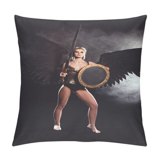 Personality  Beautiful Woman In Warrior Costume And Angel Wings Looking At Camera While Posing With Shield And Sword On Black Background Pillow Covers