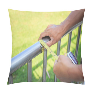 Personality  Man Measuring Stainless Steel Railing With Measuring Tape. Pillow Covers
