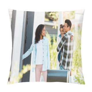 Personality  Selective Focus Of Mother Opening Door Of New House While African American Father Holding Kid Pillow Covers
