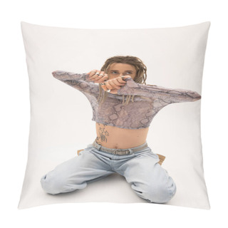 Personality  Trendy Queer Person In Crop Top Looking Away While Sitting On White Background Pillow Covers