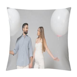 Personality  Smiling And Trendy Expecting Parents Holding Hands And White Festive Balloons While Looking At Each Other During Celebration And Gender Reveal Surprise Party On Grey Background Pillow Covers
