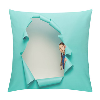 Personality  Scared Red Haired Preteen Girl In Blue T-shirt Looking At Camera While Standing Behind Hole In Blue Paper On White Background Background Pillow Covers