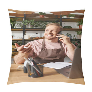 Personality  A Man Sitting At A Table In A Plant Shop, Talking On A Cell Phone While Surrounded By Greenery. Pillow Covers