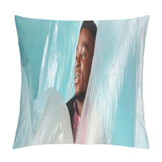 Personality  Young African American Male Model Looking Away While Standing Near Cellophane On Turquoise Background, Urban Outfit And Modern Pose, Banner, Creative Expression  Pillow Covers