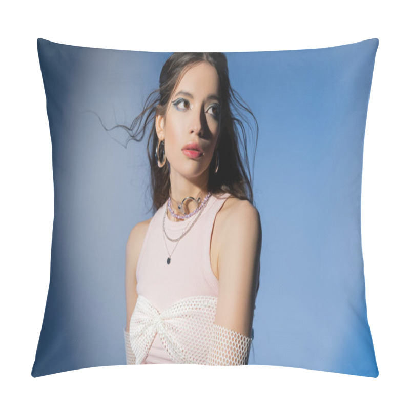 Personality  Portrait Of Young Asian Model With Bold Makeup Looking Away While Standing On Blue Background Pillow Covers