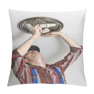 Personality  Electrician Installs Lighting The Lamp On The Ceiling Of The Room. Pillow Covers