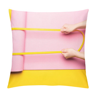 Personality  Cropped View Of Woman Holding Elastic Band On Pink Fitness Mat On Yellow Background Pillow Covers