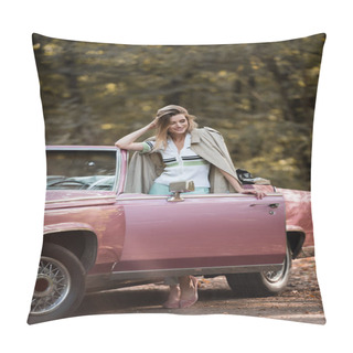 Personality  Happy Woman In Coat Standing Near Retro Cabriolet And Touching Hair Pillow Covers