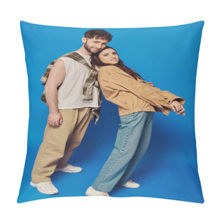 Personality  Happy And Stylish Couple In Casual Wear Posing On Blue Backdrop, Woman And Man Looking At Camera Pillow Covers