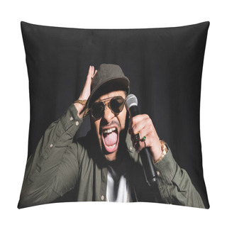 Personality  Emotional Middle East Hip Hop Performer In Sunglasses And Cap Screaming While Holding Microphone Isolated On Black Pillow Covers