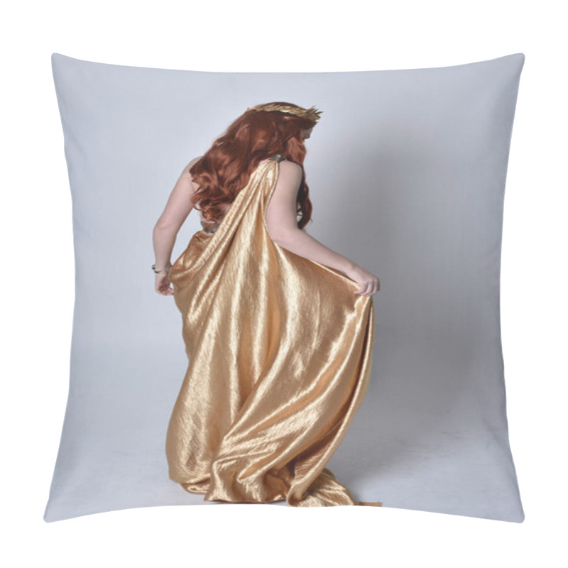 Personality  Full length portrait of girl with red hair wearing long grecian toga and golden wreath. Standing pose with back to the camera,  isolated against a grey studio background. pillow covers
