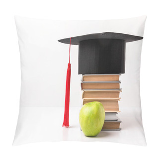Personality  Close Up View Of Apple Near Pile Of Books With Academic Cap On Top Isolated On White Pillow Covers