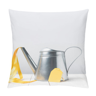 Personality  Close-up View Of Shiny Watering Pot With Yellow Ribbon And Blank Tag On Grey Pillow Covers