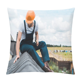 Personality  Selective Focus Of Handyman In Orange Helmet Sitting On Roof And Holding Hammer  Pillow Covers