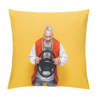 Personality  Tensed Middle Aged Man In Bomber Jacket Holding Steering Wheel And Imitating Driving Isolated On Yellow Pillow Covers