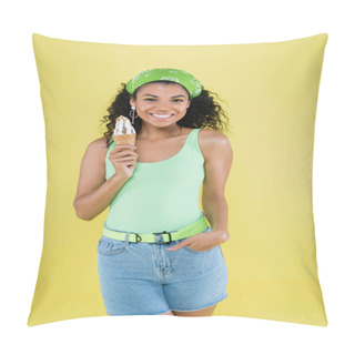 Personality  Happy African American Woman In Green Kerchief Holding Ice Cream And Standing With Hand In Pocket Isolated On Yellow Pillow Covers