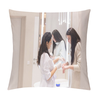 Personality  Two Women, A Beautician Doctor And A Client, Stand At The Mirror, For A Consultation, The Doctor Applies Cream To The Woman's Hands And Makes A Light Massage Pillow Covers