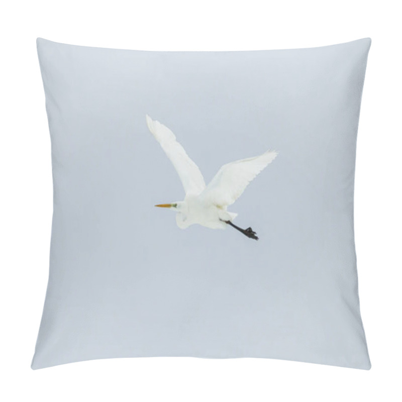Personality  A great egret in flight pillow covers