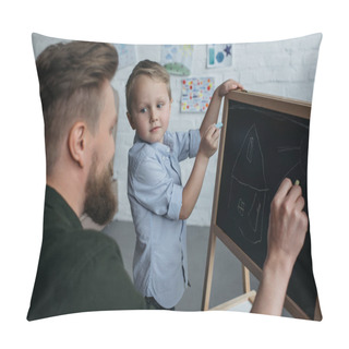 Personality  Side View Of Little Boy And Father With Pieces Of Chalk Drawing Picture On Blackboard At Home Pillow Covers