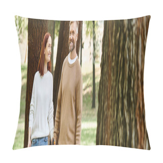 Personality  A Man And A Woman Walk Hand In Hand Through A Lush Forest. Pillow Covers