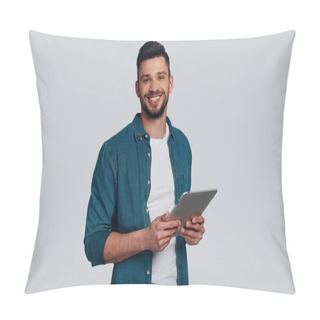 Personality  Handsome Young Man Holing Digital Tablet And Looking At Camera With Smile While Standing Against Grey Background Pillow Covers