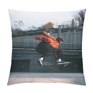 Personality  Skateboarder In Red Jacket Performing Jump Trick In Urban Location Pillow Covers