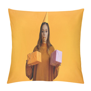 Personality  Teenage Girl In Party Cap Looking At Camera While Blowing Party Horn And Holding Presents Isolated On Yellow Pillow Covers