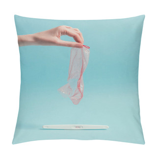 Personality  Cropped Shot Of Woman Holding Ripped Condom In Hand And Pregnancy Test Isolated On Blue Pillow Covers