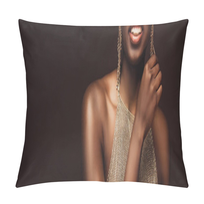 Personality  cropped view of smiling african american woman with earrings isolated on brown pillow covers