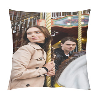 Personality  Pretty Young Woman In Trench Coat Riding Carousel Horse Near Blurred Boyfriend Pillow Covers