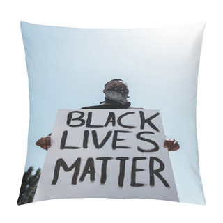 Personality  Low Angle View Of African American Man With Scarf On Face Holding Placard With Black Lives Matter Lettering Against Blue Sky Pillow Covers