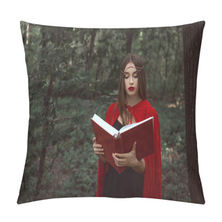 Personality  Attractive Mystic Woman In Red Cloak And Wreath Reading Magic Book In Forest Pillow Covers