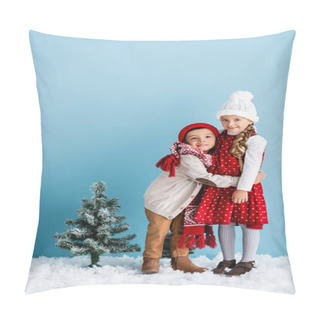 Personality  Kids In Winter Outfit Embracing Near Christmas Tree On Blue Pillow Covers