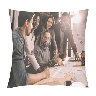 Personality  Concentrated Multiethnic Group Of Colleagues Working Together On New Project In Modern Loft Office With Backlit Pillow Covers