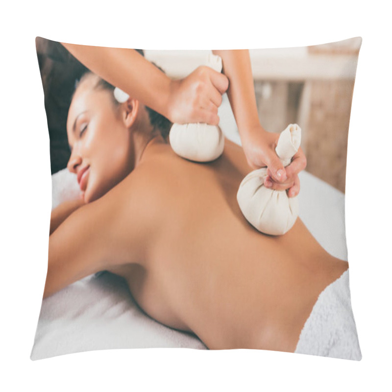 Personality  attractive woman receiving treatment at massage center pillow covers