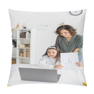 Personality  Smiling Mother Standing Near Daughter Holding Paper With Letters During Speech Therapy Online Lesson At Home  Pillow Covers