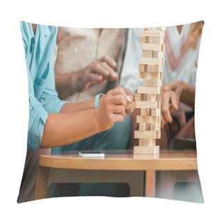 Personality  Cropped Shot Of Mature Friends Building Tower From Wooden Blocks On Table Pillow Covers