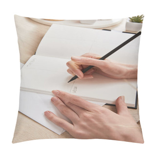 Personality  Cropped View Of Woman Writing In Notebook On Wooden Surface Pillow Covers