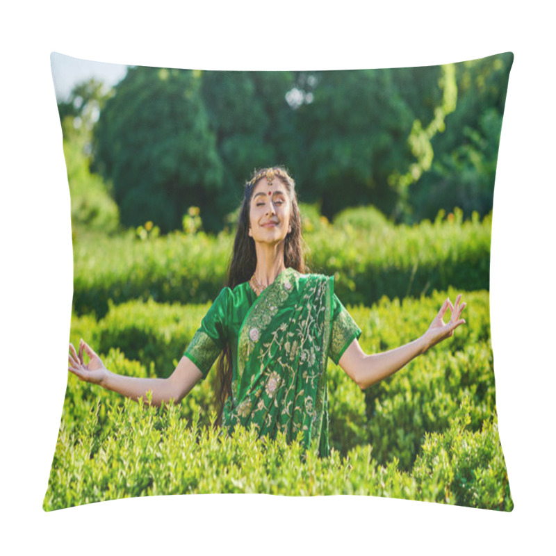 Personality  Smiling And Stylish Young Indian Woman In Sari Meditating Near Green Plants In Park Pillow Covers