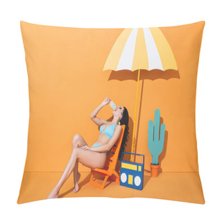 Personality  Stylish Woman In Sunglasses And Swimwear Sitting On Deck Chair Near Boombox And Umbrella While Licking Paper Ice Cream On Orange Pillow Covers