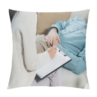 Personality  Cropped Shot Of Psychotherapist Writing On Clipboard And Male Patient Lying On Couch Pillow Covers