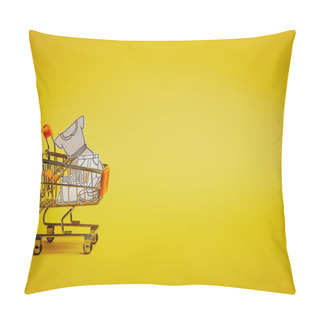 Personality  Close Up View Of Little Shopping Trolley With Paper Clothes On Yellow Backdrop Pillow Covers